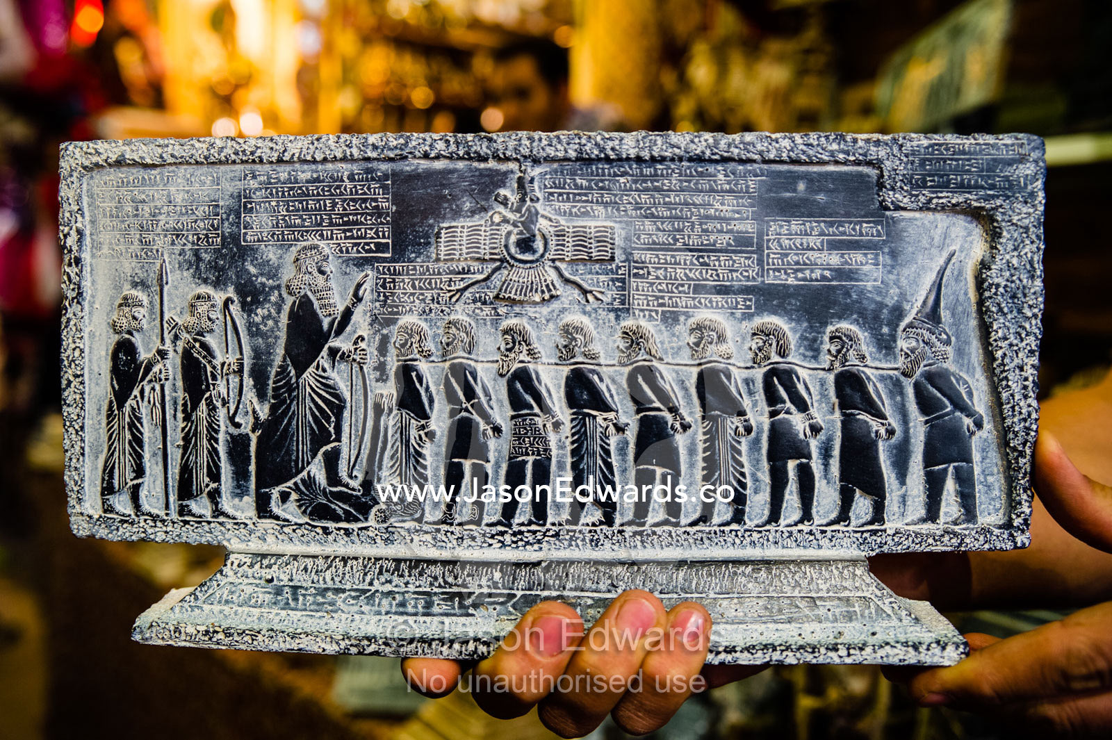 A replica statue of the Behistun Inscription sold in a bazaar. Vakil Bazaar, Shiraz, Islamic Republic of Iran.