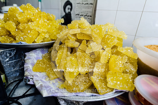 Nabaat is a type of confectionary composed of large sugar crystals. Saraye Moshir, Shiraz, Islamic Republic of Iran.