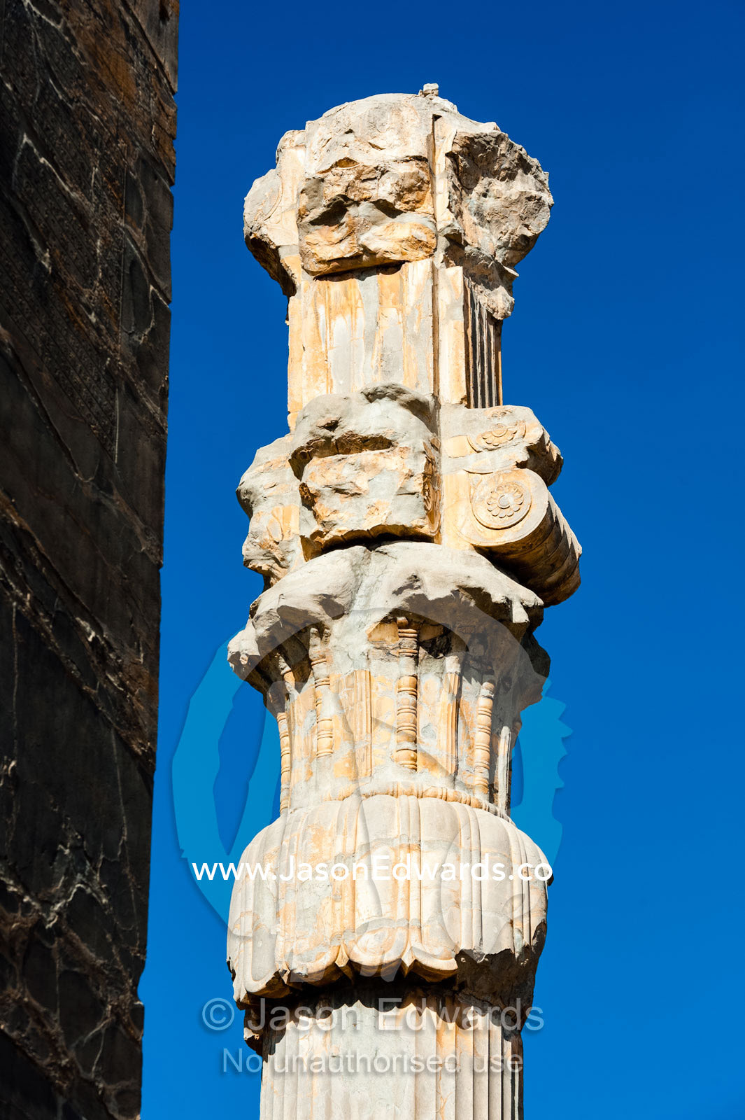 The carved stone capital of a column in the Gate of All Nations. Persepolis, Shiraz, Fars Province, Islamic Republic of Iran.