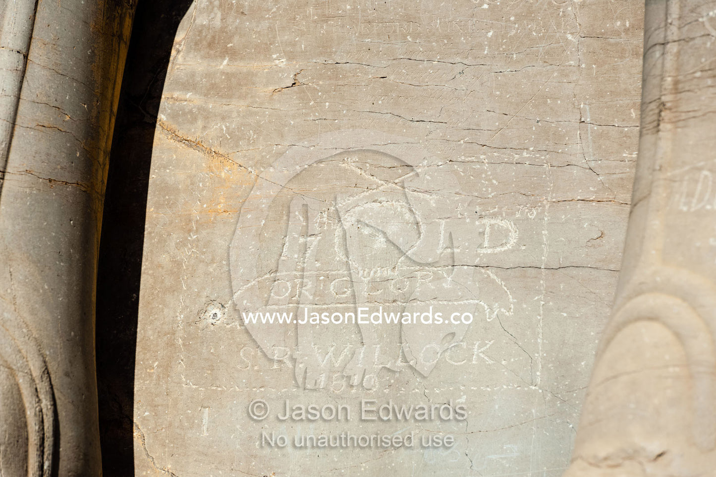 Antique graffiti on the protective gods known as Lamassu at the Gate of All Nations in Persepolis. Persepolis, Shiraz, Fars Province, Islamic Republic of Iran.
