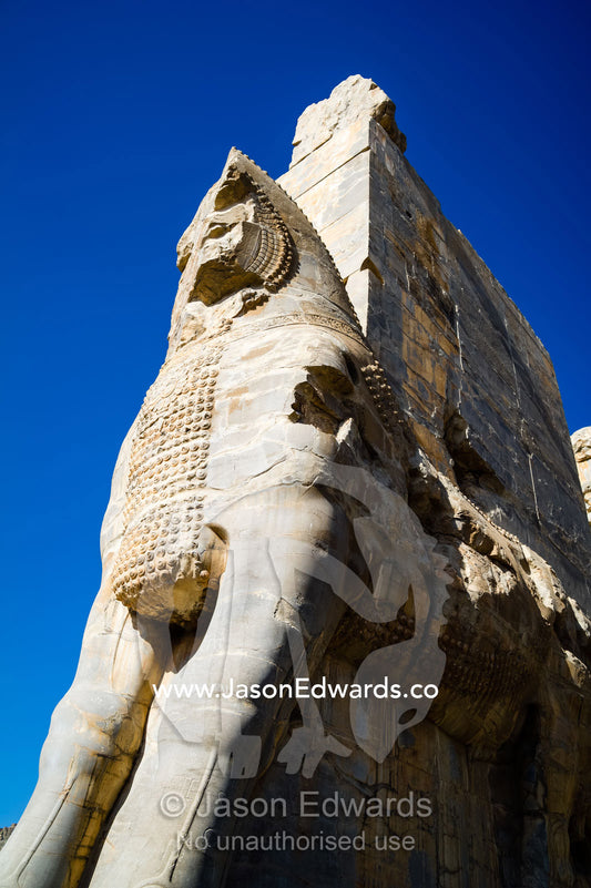 Towering protective gods known as Lamassu at the Gate of All Nations in Persepolis. Persepolis, Shiraz, Fars Province, Islamic Republic of Iran.