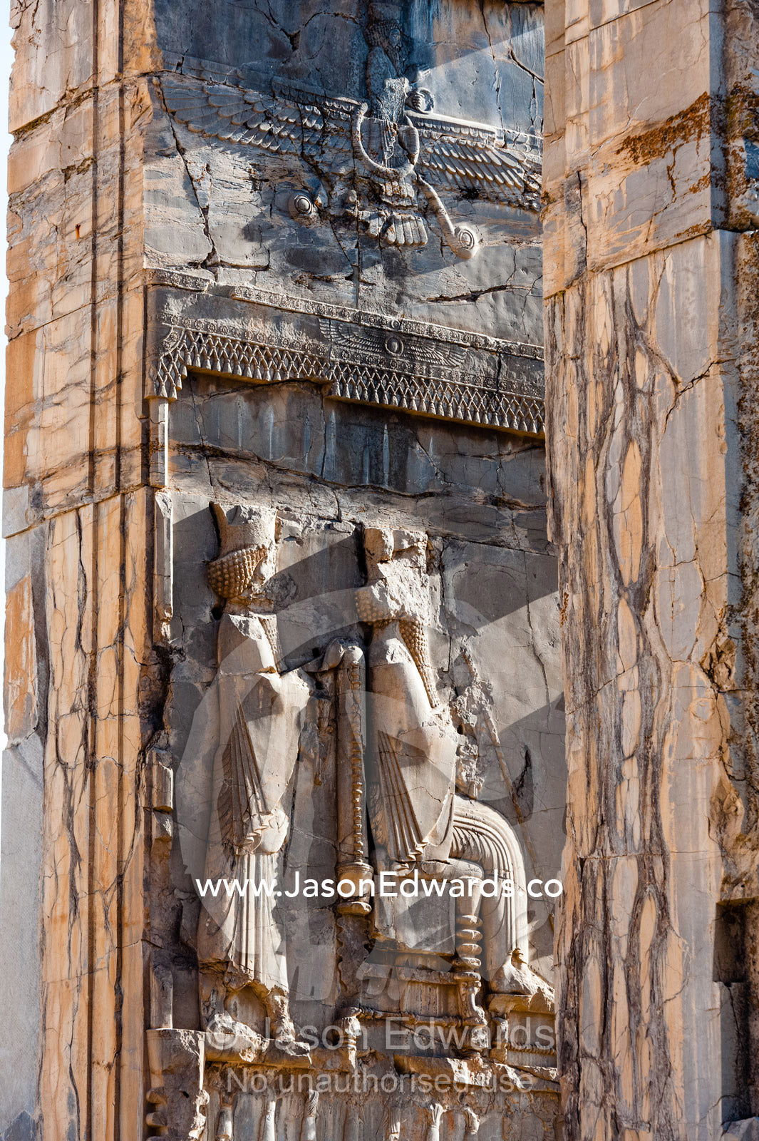 A frieze of the King carved into the stone at the entrance gate to the Palace of 100 Columns. Persepolis, Shiraz, Fars Province, Islamic Republic of Iran.