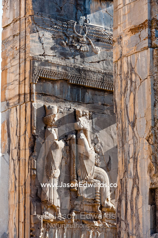 A frieze of the King carved into the stone at the entrance gate to the Palace of 100 Columns. Persepolis, Shiraz, Fars Province, Islamic Republic of Iran.