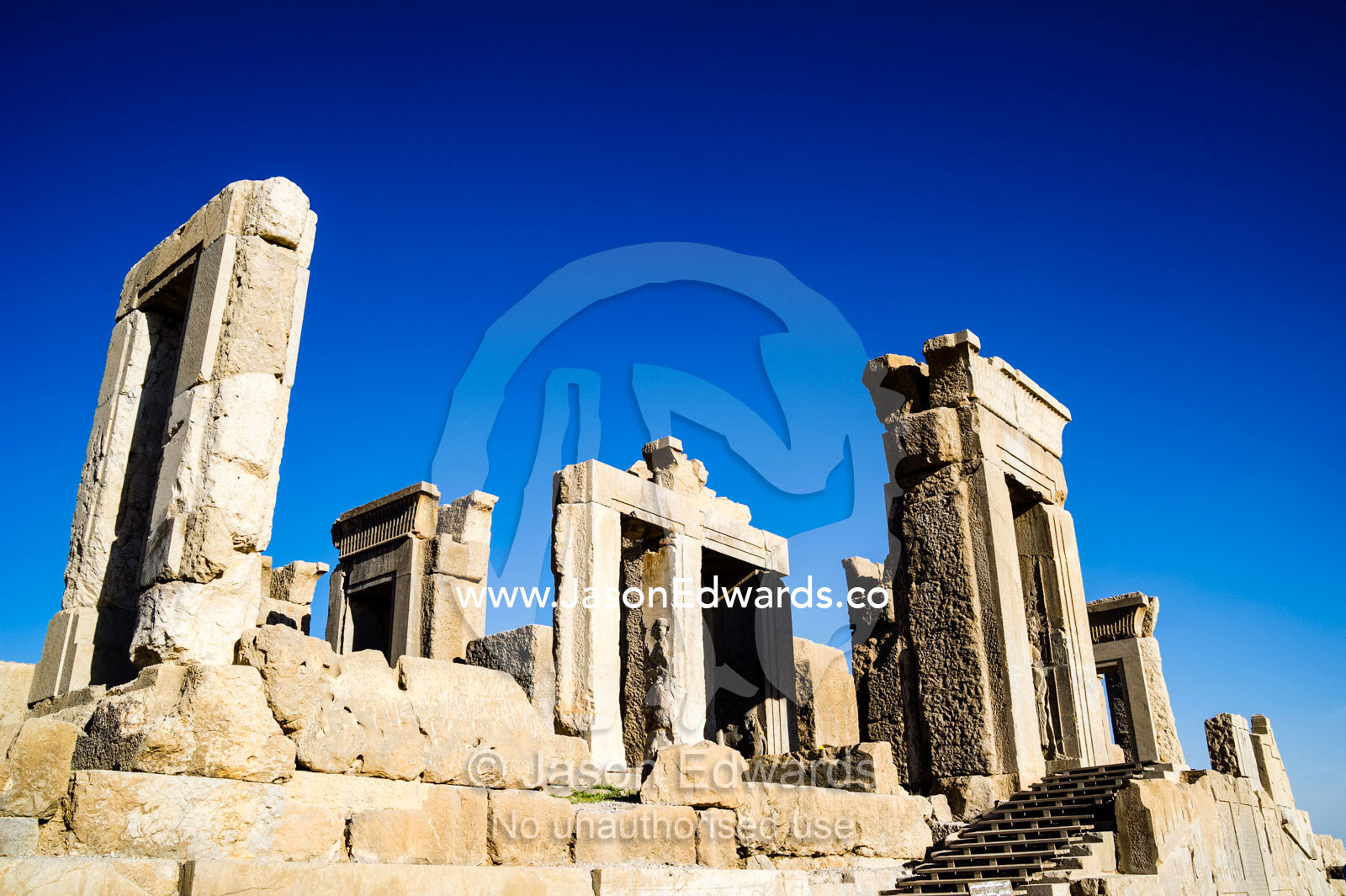 The towering columns, doorways and lintels of the Tachara Palace. Persepolis, Shiraz, Fars Province, Islamic Republic of Iran.