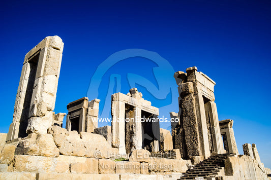 The towering columns, doorways and lintels of the Tachara Palace. Persepolis, Shiraz, Fars Province, Islamic Republic of Iran.