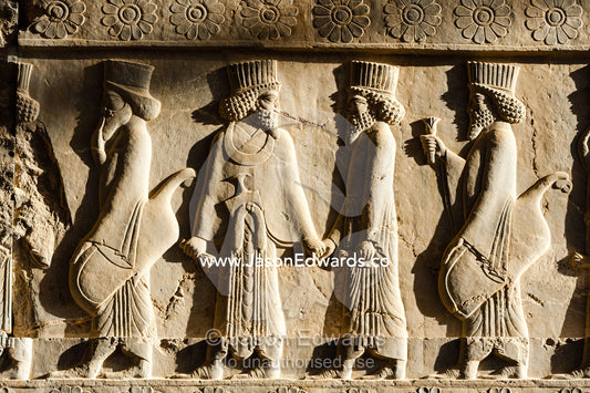 A limestone frieze of the royal family, immortal guards, commanders and nobles from the Pars people. Persepolis, Shiraz, Fars Province, Islamic Republic of Iran.