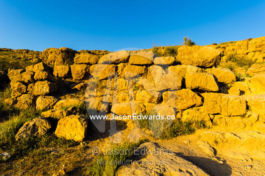 An ancient rock wall at the ruins of Persepolis. Persepolis, Shiraz, Fars Province, Islamic Republic of Iran.