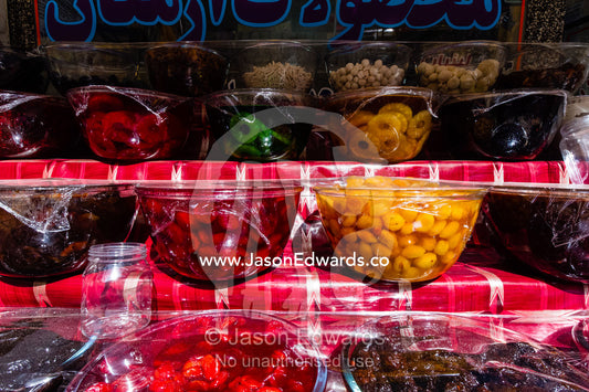 Pickle jars of plum and apricot in a village market. Niasar, Neyasar District, Kashan County, Isfahan Province, Islamic Republic of Iran.
