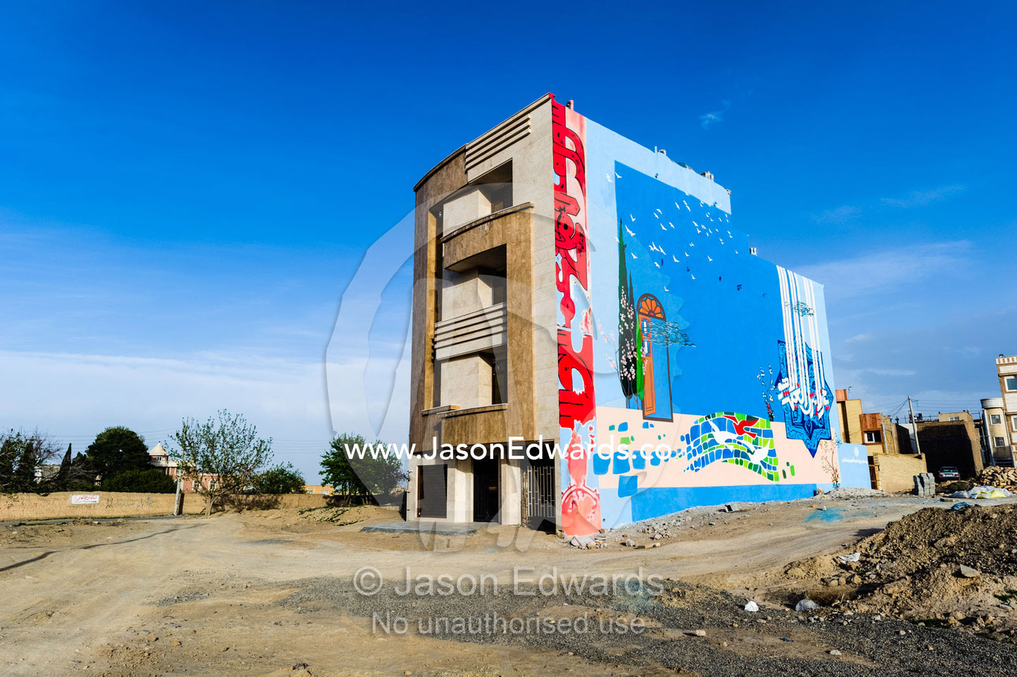 A colorful mural on the external wall of an apartment block. Kashan, Isfahan, Islamic Republic of Iran.