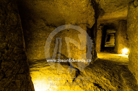 Tunnels and rooms carved into the rock to form an ancient underground city used for defense. Ouyi, Noushabad, Kashan, Isfahan province, Islamic Republic of Iran.