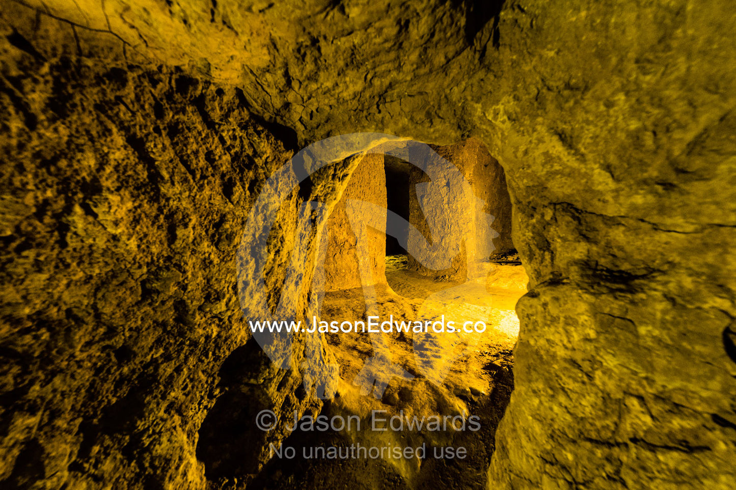 Tunnels and rooms carved into the rock to form an ancient underground city used for defense. Ouyi, Noushabad, Kashan, Isfahan province, Islamic Republic of Iran.