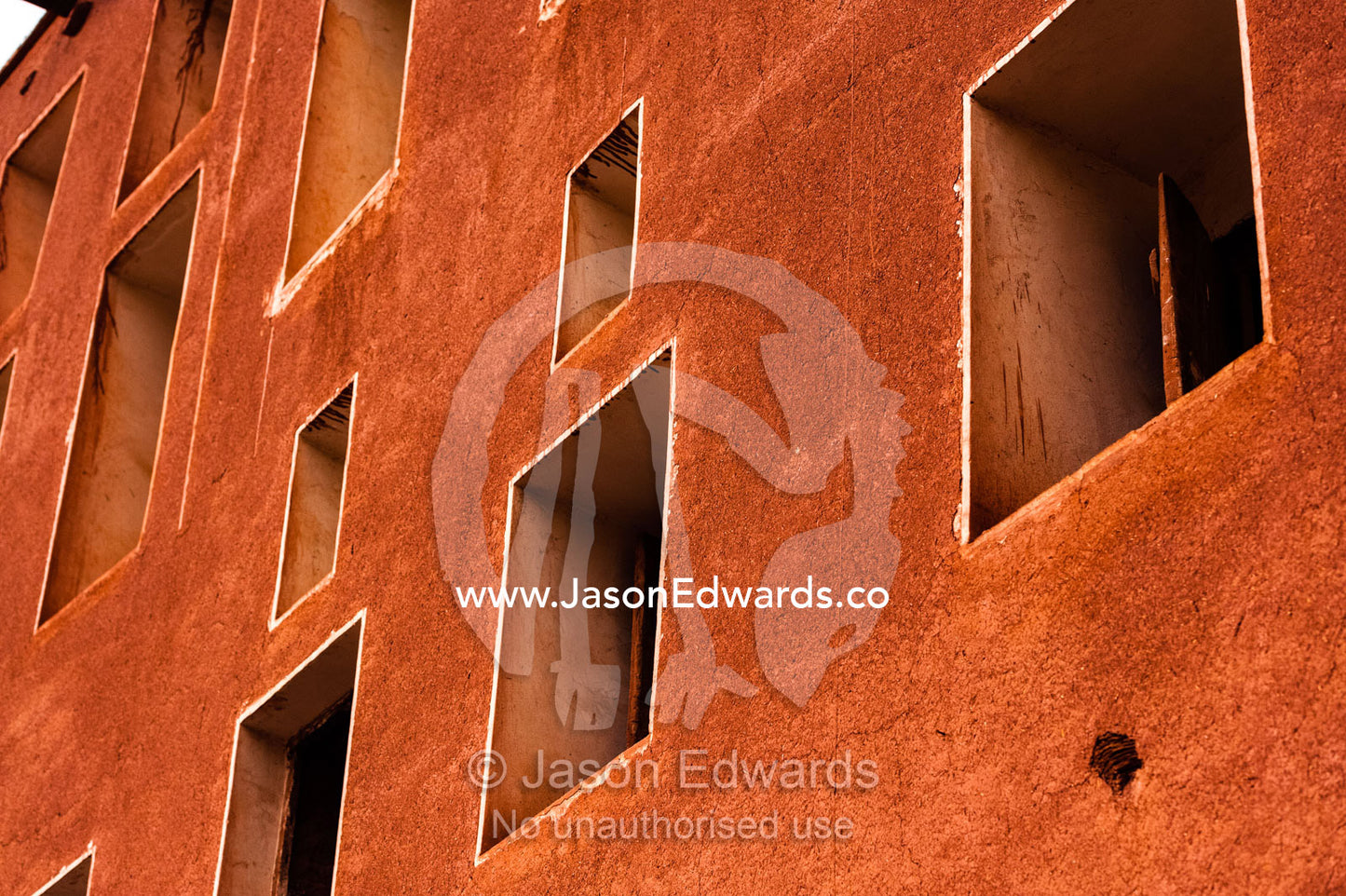 The red ochre window sills of a house in a mountain village. Abyaneh Village, Abyaneh, Barzrud Rural District, Natanz County, Isfahan Province, Islamic Republic of Iran.