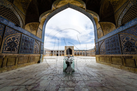 Looking out onto the main courtyard through an iwan of the Jameh Mosque. Jameh Mosque of Isfahan, Isfahan, Isfahan Province, Islamic Republic of Iran.