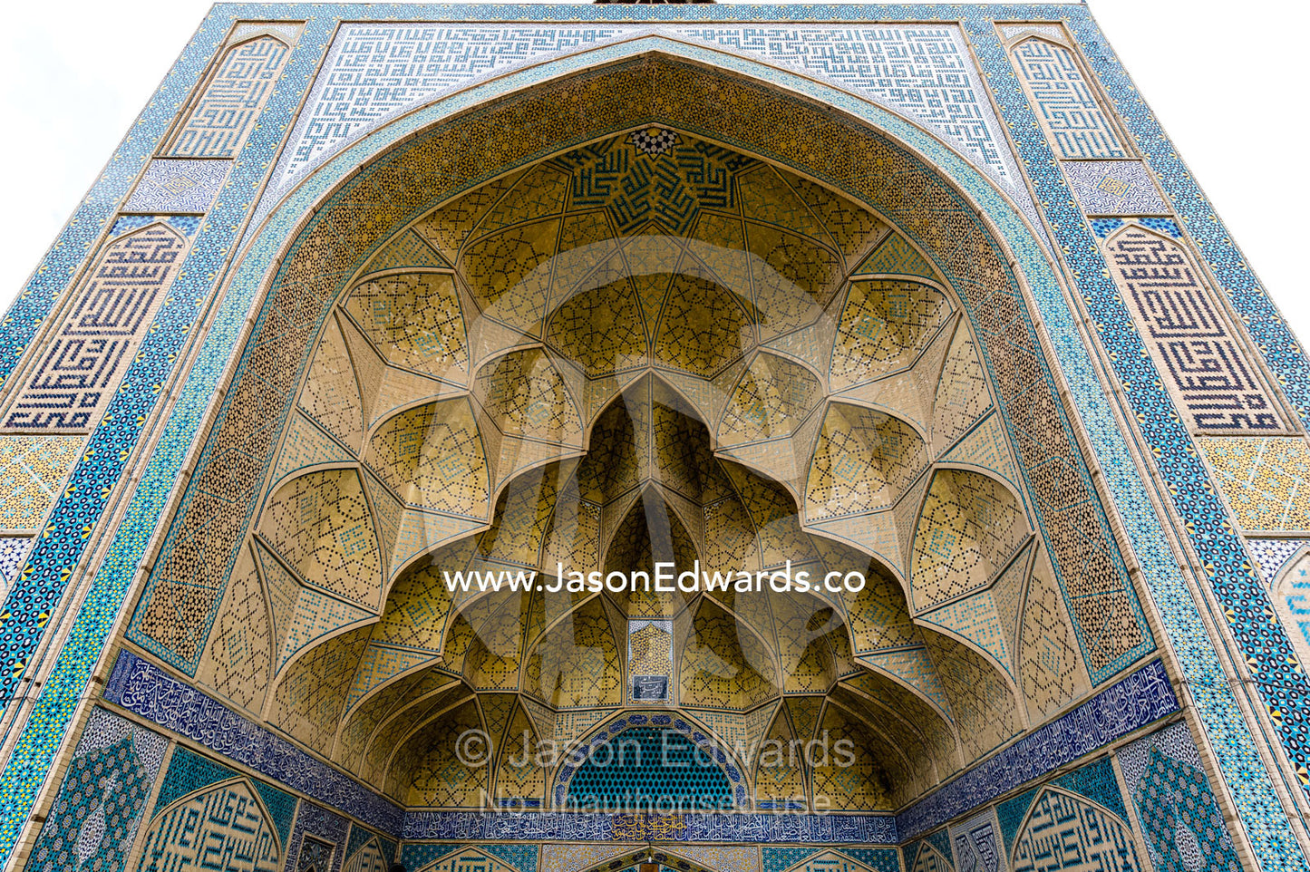 The intricate tiled muqarnas on the vaulted surface of the iwan of Jameh Mosque. Jameh Mosque of Isfahan, Isfahan, Isfahan Province, Islamic Republic of Iran.