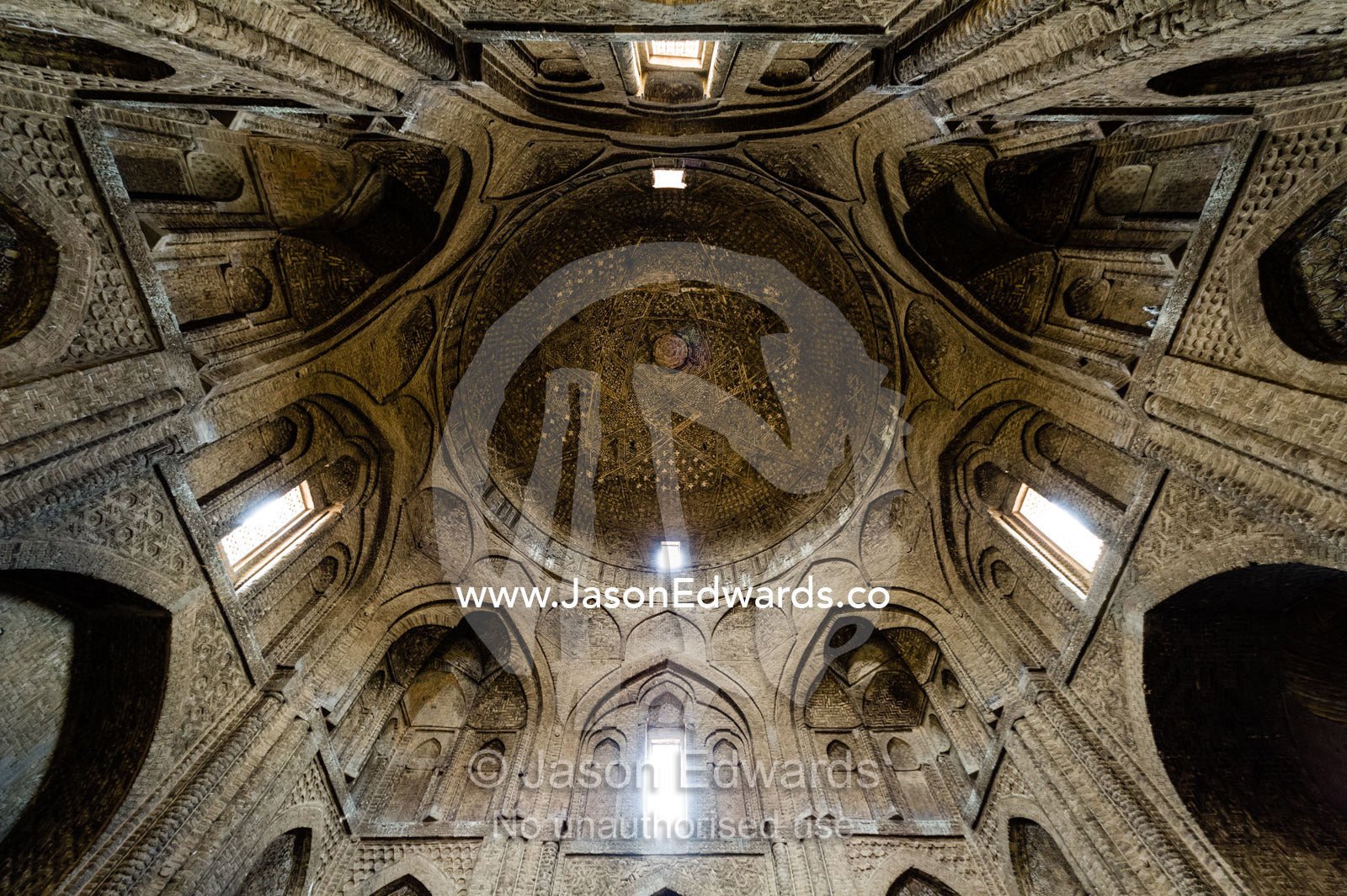 The cavernous, vaulted and domed ceiling of the Jameh Mosque in Iran. Jameh Mosque of Isfahan, Isfahan, Isfahan Province, Islamic Republic of Iran.