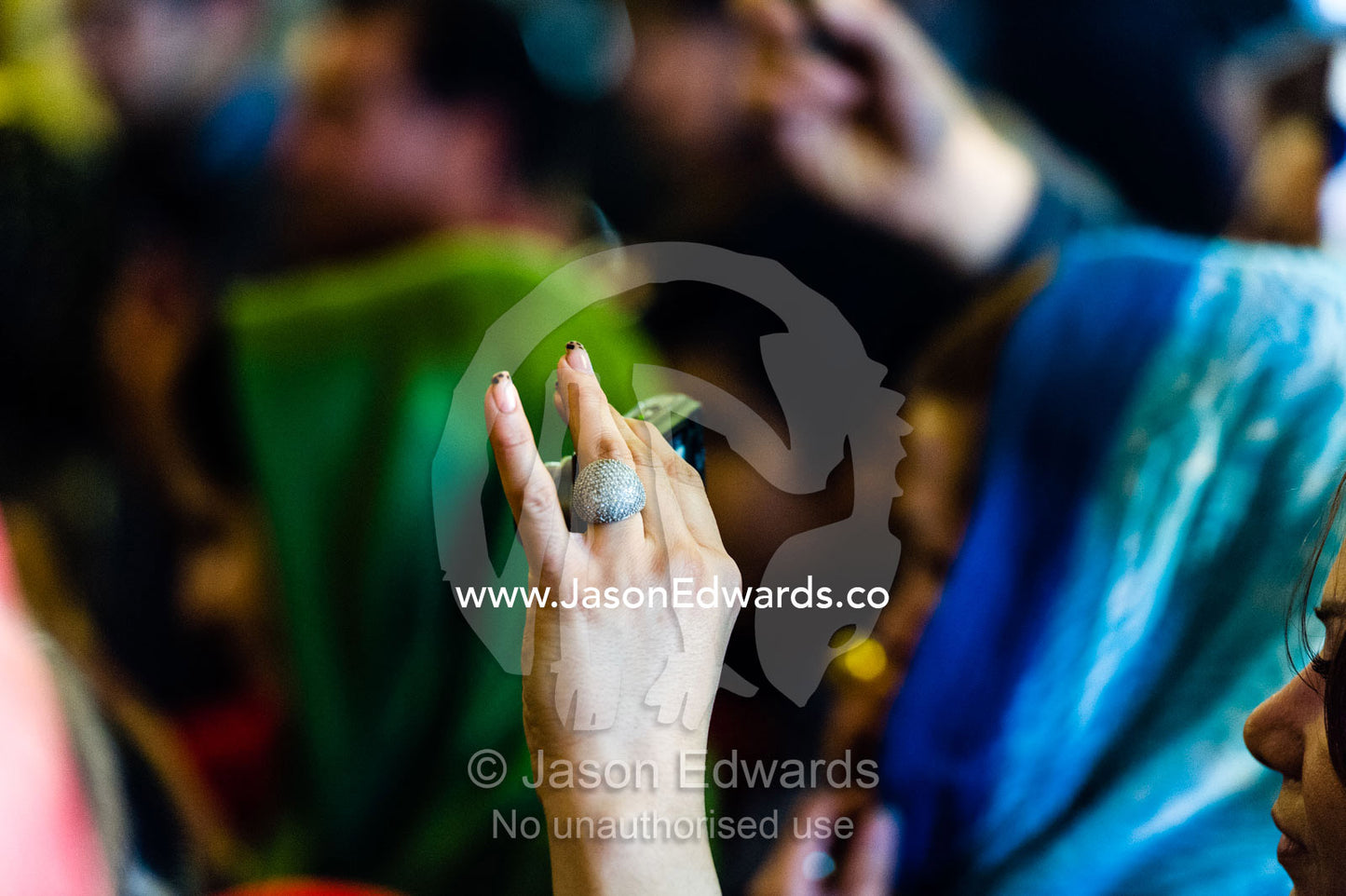 An opulent ring covered in diamonds on the hand of a lady at an Iranian New Year party Nowruz. The Abbasi Hotel, Isfahan, Isfahan Province, Islamic Republic of Iran.
