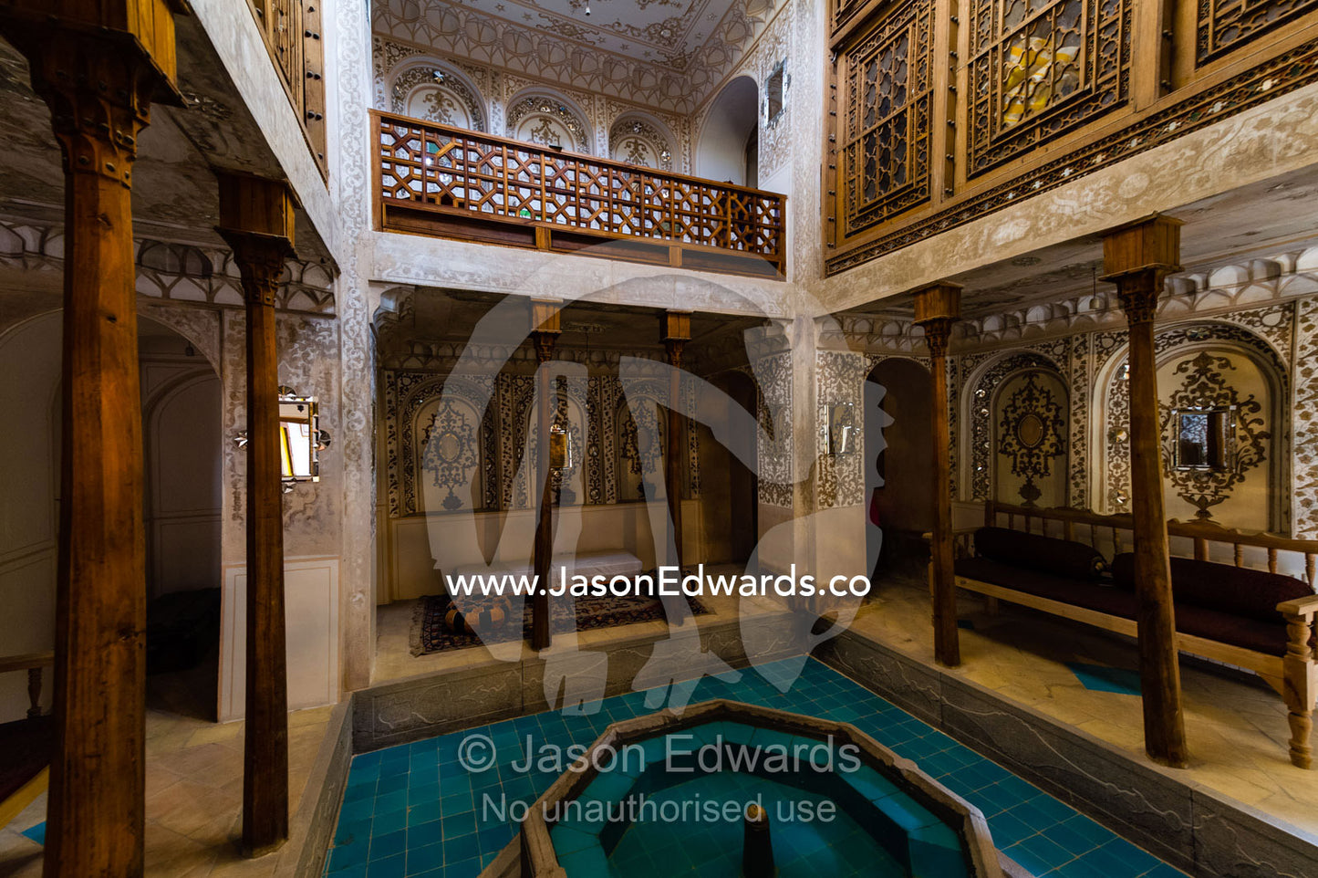 Balconies surround an internal courtyard and pond in a traditional house. Dibai house, Isfahan, Isfahan Province, Islamic Republic of Iran.