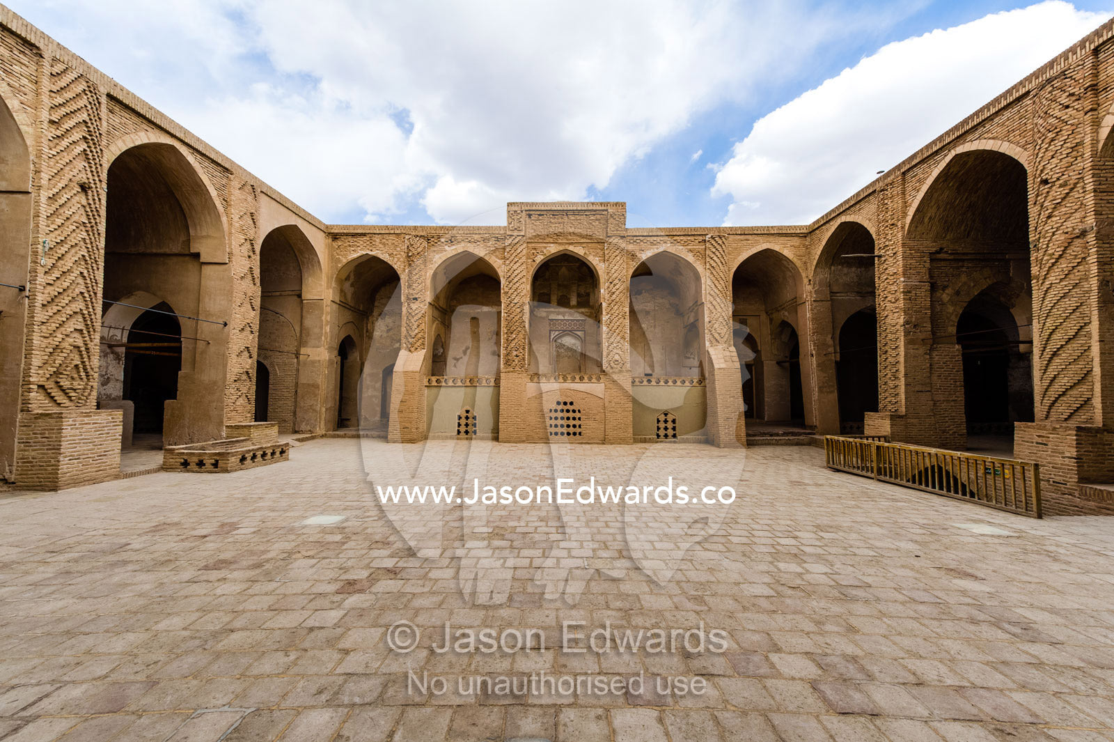 The paved main courtyard the Jame Mosque as seen through the riwaq. Jameh Mosque of Nain, Nain, Nain County, Isfahan Province, Iran.