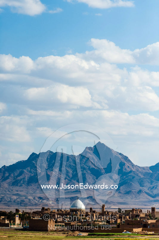 The dome of a village Mosque visible across a rural plain. Road to Yazd, Yazd Province, Islamic Republic of Iran.