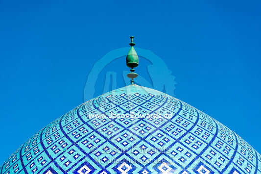 The shining blue tiled dome of the Seyyed mosque beneath a sunny sky. Seyyed Mosque, Yazd, Yazd Province, Islamic Republic of Iran.