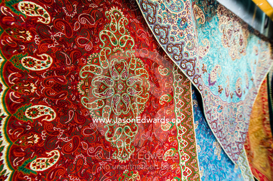 A shop in a bazaar selling termeh fabric an intricate and delicate cloth. Yazd, Yazd Province, Islamic Republic of Iran.