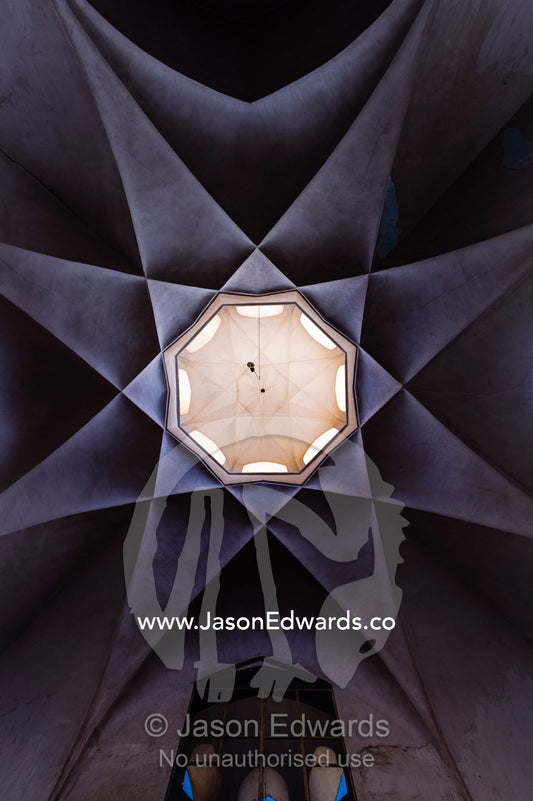 The wonderful geometric star-shaped ceiling of an ancient bazaar. Yazd, Yazd Province, Islamic Republic of Iran.