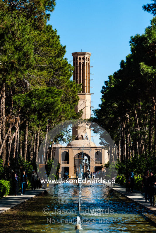 A windcatcher overlooks an ornamental pond in a traditional garden. Dowlat Abad Garden, Yazd, Yazd Province, Islamic Republic of Iran.