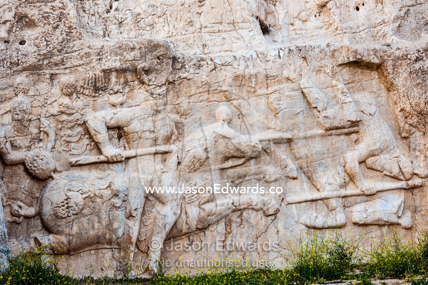 A carving of the Victory of King Hormoz the 2nd against the Roman emperor at the archeological site of Naqsh-e Rustam also known as the Necropolis. Tombs of the Kings, Naqsh-e Rustam, Fars Province, Islamic Republic of Iran.