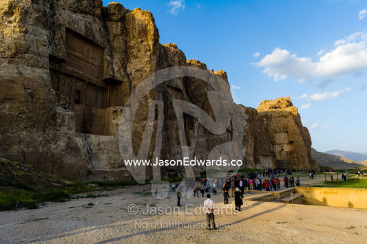 Iranian tourists visit the four tombs belonging to Achaemenid kings carved from the rock face at the archeological site of Naqsh-e Rustam also known as the Necropolis. Tombs of the Kings, Naqsh-e Rustam, Fars Province, Islamic Republic of Iran.