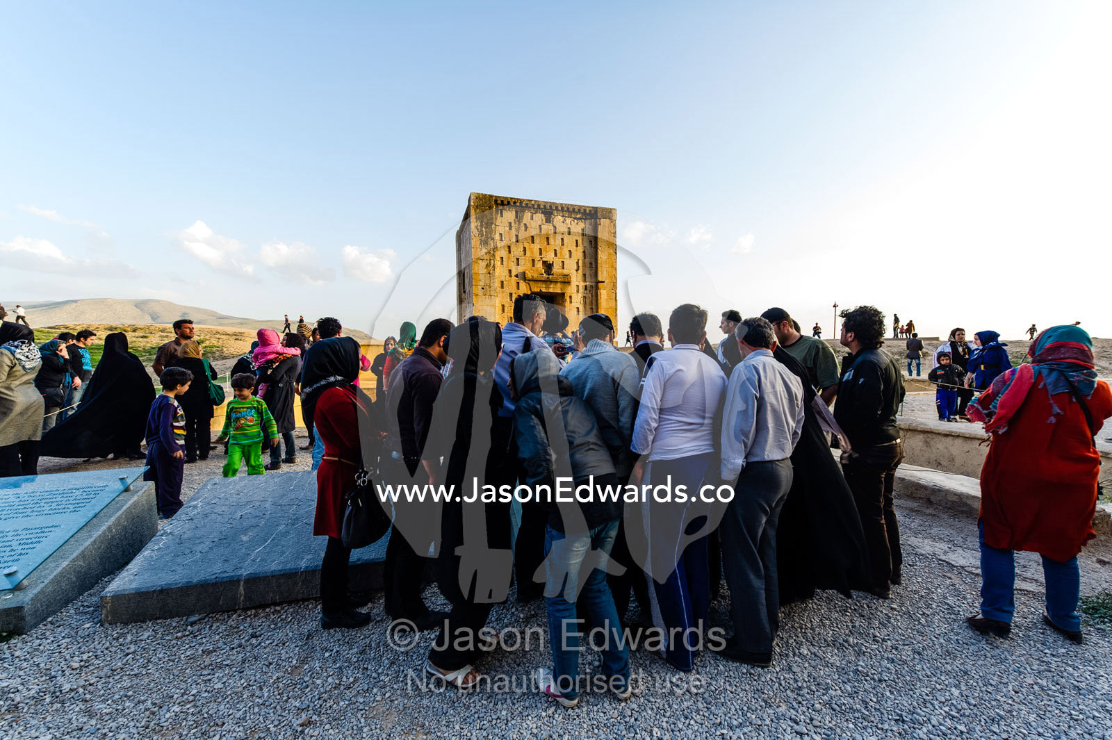 Iranian tourists visit the four tombs belonging to Achaemenid kings carved from the rock face at the archeological site of Naqsh-e Rustam also known as the Necropolis. Tombs of the Kings, Naqsh-e Rustam, Fars Province, Islamic Republic of Iran.