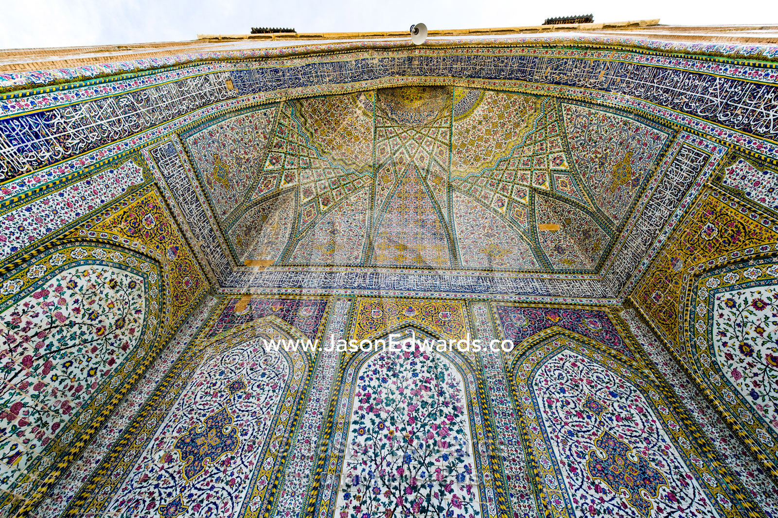 The intricate tiled muqarnas on the vaulted surface of the iwan in Vikal Mosque. Vakil Mosque, Shiraz, Fars Province, Islamic Republic of Iran.