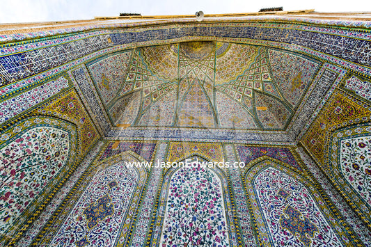 The intricate tiled muqarnas on the vaulted surface of the iwan in Vikal Mosque. Vakil Mosque, Shiraz, Fars Province, Islamic Republic of Iran.