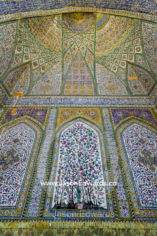The intricate tiled muqarnas on the vaulted surface of the iwan in Vikal Mosque. Vakil Mosque, Shiraz, Fars Province, Islamic Republic of Iran.