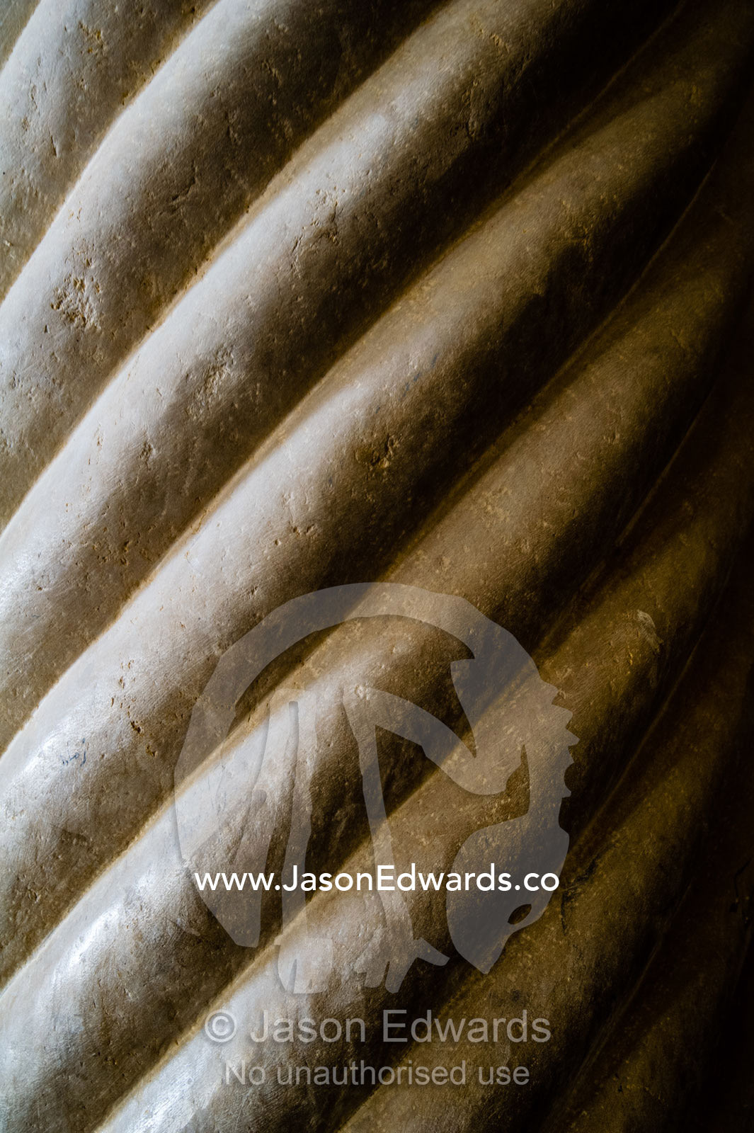 Coiling rope patterns on a stone column in the Vakil Mosque. Vakil Mosque, Shiraz, Fars Province, Islamic Republic of Iran.