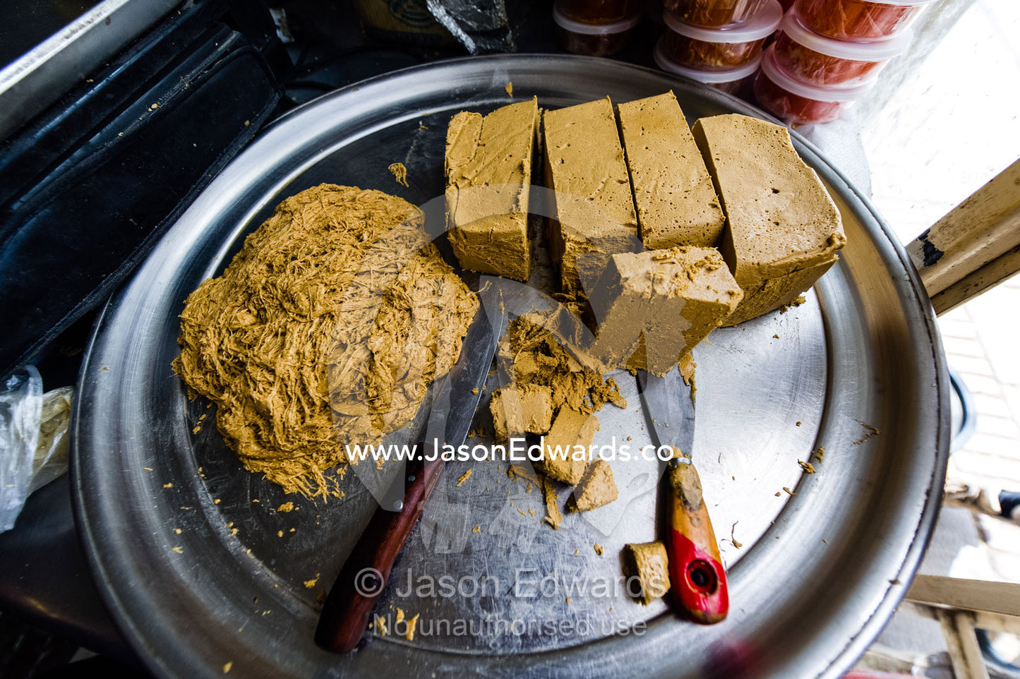 Slabs of sesame pudding for sale in a bazaar market. Shiraz, Fars Province, Islamic Republic of Iran.