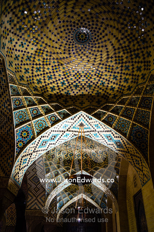 Spiraling tile patterns on the ceiling of the Nasir ol Molk Mosque. Nasir ol Molk Mosque, Shiraz, Fars Province, Islamic Republic of Iran.