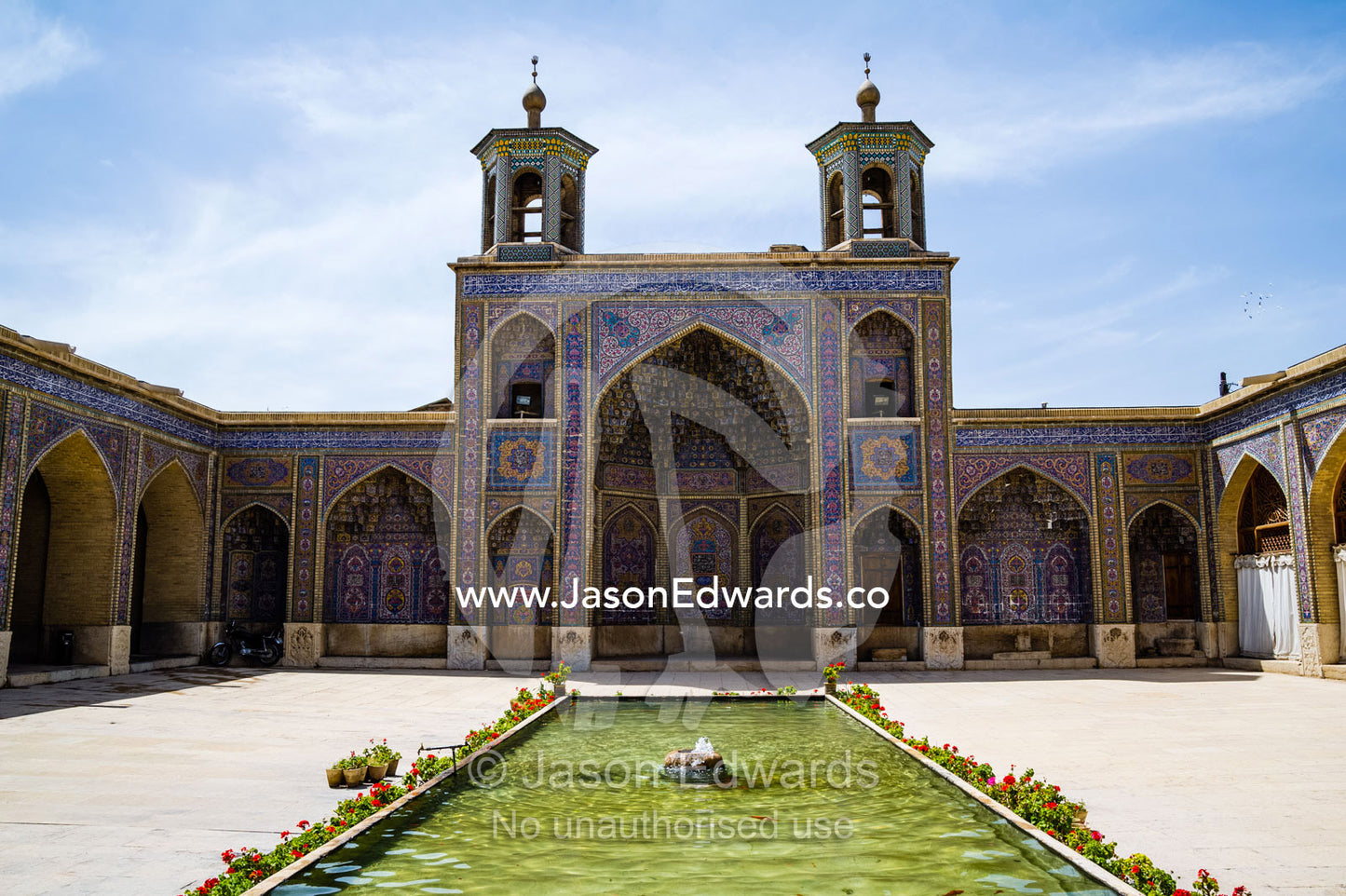 The iwan and sahn, ornamental pond, of the Nasir ol Molk Mosque. Nasir ol Molk Mosque, Shiraz, Fars Province, Islamic Republic of Iran.