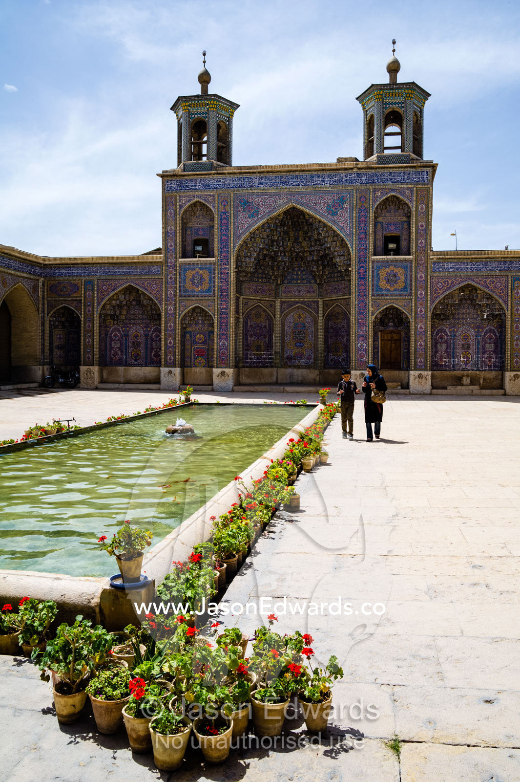 The iwan and sahn, ornamental pond, of the Nasir ol Molk Mosque. Nasir ol Molk Mosque, Shiraz, Fars Province, Islamic Republic of Iran.