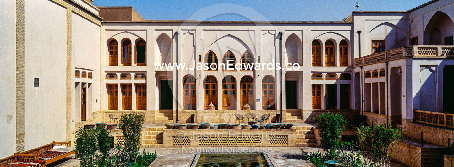The traditional gardens and ornamental pond in a merchants house. Tabatabayi House, Kashan, Isfahan, Islamic Republic of Iran.