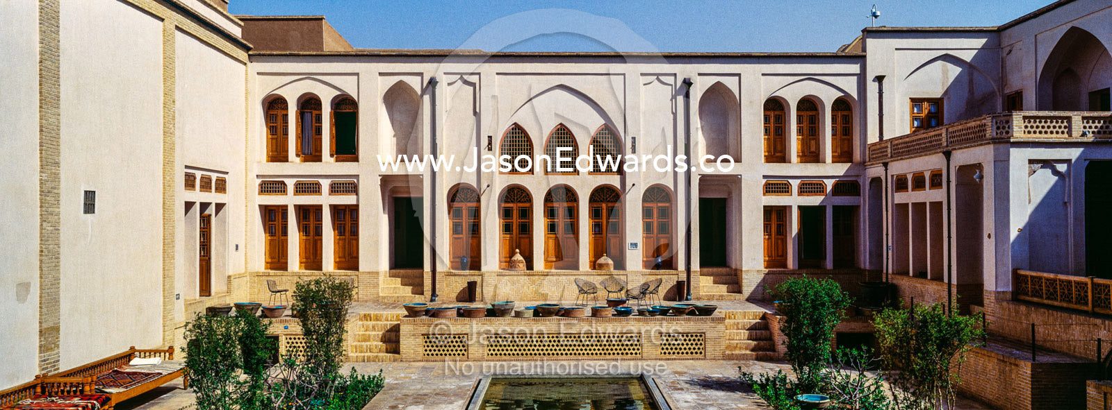 The traditional gardens and ornamental pond in a merchants house. Tabatabayi House, Kashan, Isfahan, Islamic Republic of Iran.