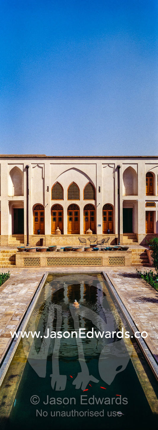 The traditional gardens and ornamental pond in a merchants house. Tabatabayi House, Kashan, Isfahan, Islamic Republic of Iran.