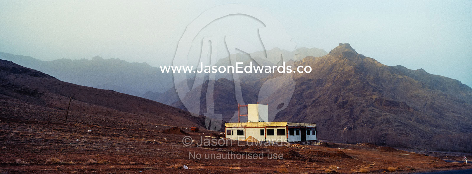 An abandoned government building in the desert mountains. Abyaneh, Barzrud Rural District, Natanz County, Isfahan Province, Islamic Republic of Iran.