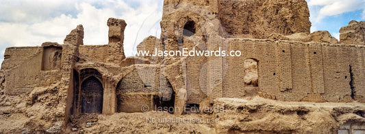 The ruins of a mub brick fortress collapsing back into the desert. Nain, Nain County, Isfahan Province, Islamic Republic of Iran.