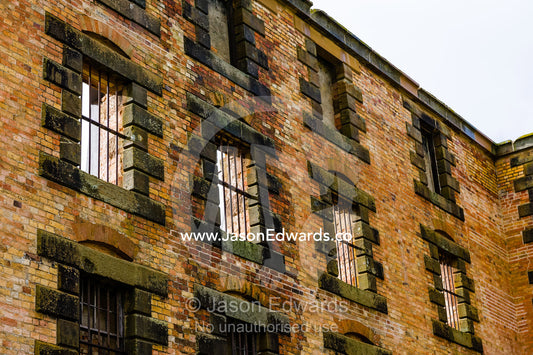 Steel bars in the windows of the facade of the Port Arthur penitentiary. Port Arthur Historic Site, Port Arthur, Tasmania,
Australia.