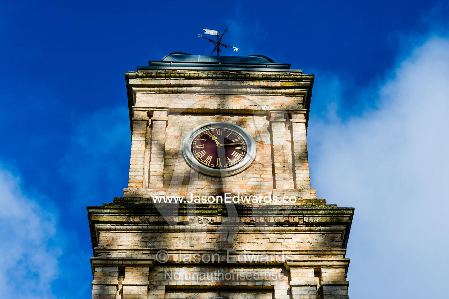 Dappled sunlight on the clock tower above the Asylum that cared for infirm prisoners. Port Arthur Historic Site, Port Arthur, Tasmania,
Australia.