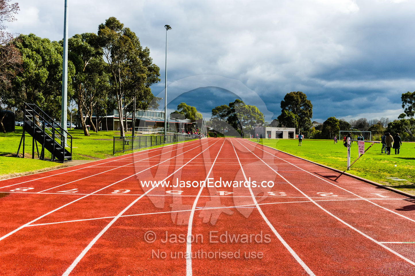 The numbered running lanes on an athletic race track. Collingwood, Melbourne, Victoria, Australia.
