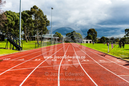 The numbered running lanes on an athletic race track. Collingwood, Melbourne, Victoria, Australia.