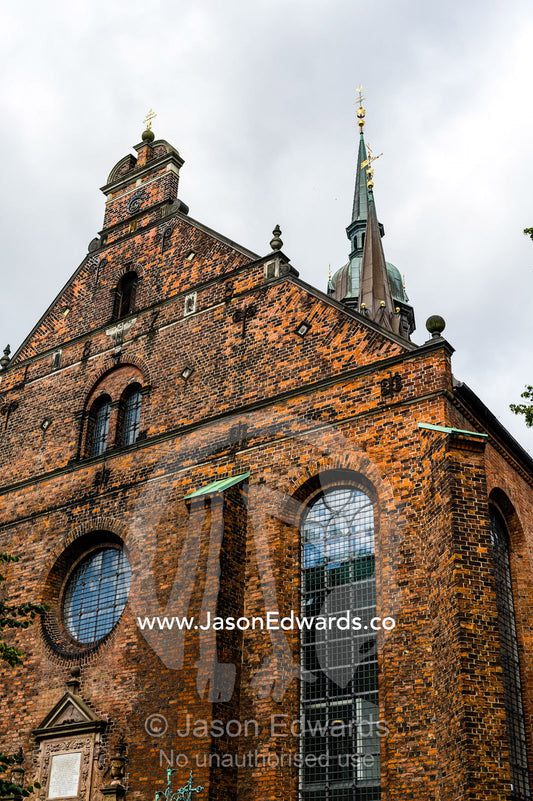 The imposing brick and glass facade of the Church of the Holy Spirit. Church of the Holy Spirit, Copenhagen, Denmark.