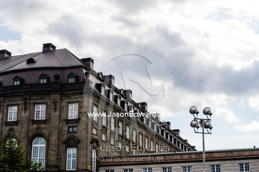 Long rows of windows line the facade of the Christiansborg Palace. Christiansborg Palace, Copenhagen, Denmark.