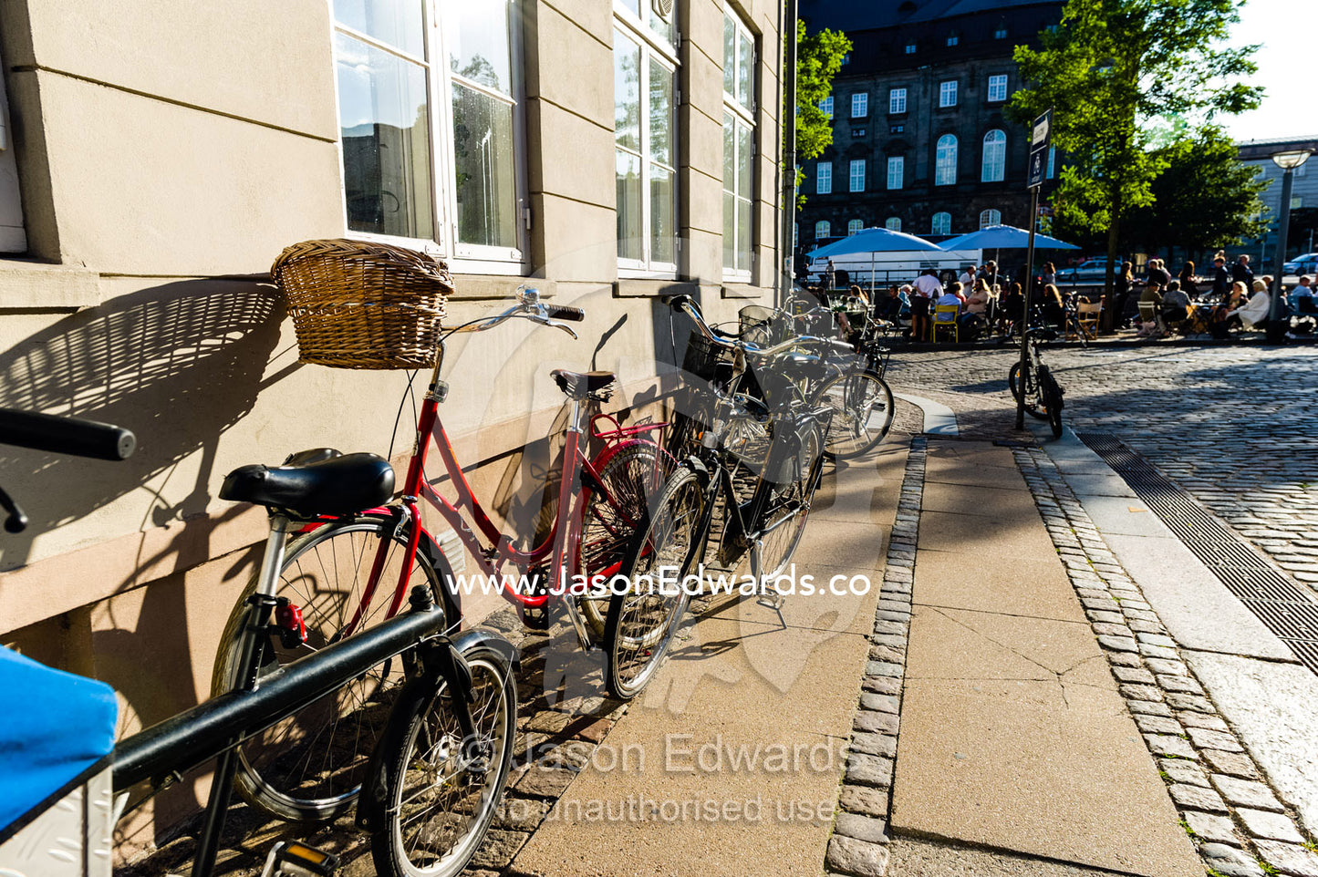Bikes leaning against a wall on a summers day in Copenhagen. Copenhagen, Denmark.